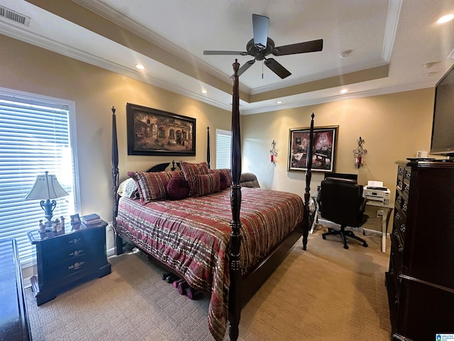 5050 Lily Rd, Hokes Bluff, AL 35903 - bedroom featuring light carpet, a tray ceiling, baseboards, visible vents, and crown molding
