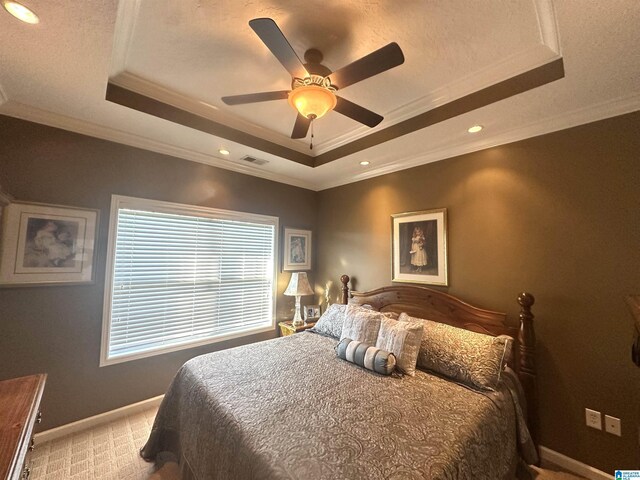 5050 Lily Rd, Hokes Bluff, AL 35903 - bedroom featuring a tray ceiling, visible vents, recessed lighting, light colored carpet, and crown molding
