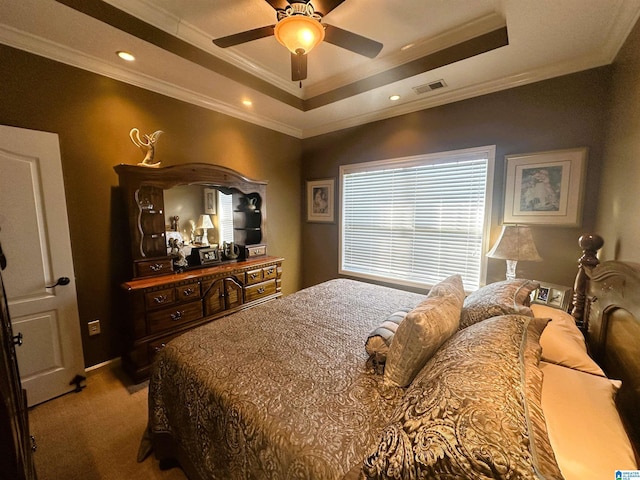 5050 Lily Rd, Hokes Bluff, AL 35903 - bedroom with a raised ceiling, visible vents, a ceiling fan, ornamental molding, and carpet floors