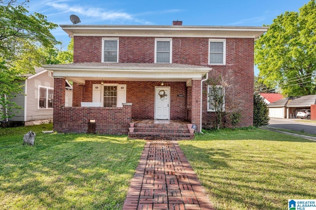 2910 W Meighan Blvd, Gadsden, AL 35904 - traditional home featuring a front lawn and brick siding