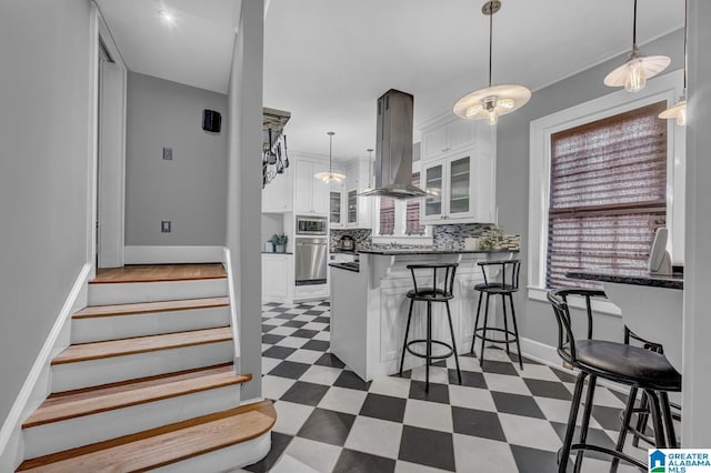 2910 W Meighan Blvd, Gadsden, AL 35904 - staircase with tile patterned floors and baseboards