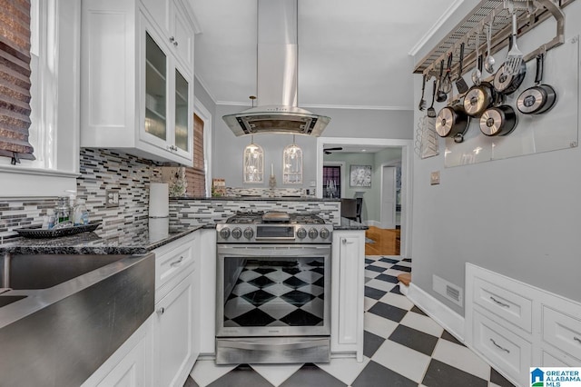 2910 W Meighan Blvd, Gadsden, AL 35904 - kitchen featuring light floors, island range hood, stainless steel gas range, and tasteful backsplash