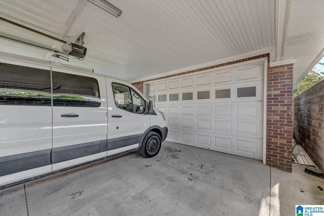 2910 W Meighan Blvd, Gadsden, AL 35904 - garage featuring a garage door opener
