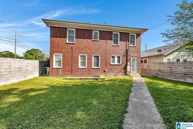 2910 W Meighan Blvd, Gadsden, AL 35904 - back of property featuring brick siding, fence, a yard, and entry steps