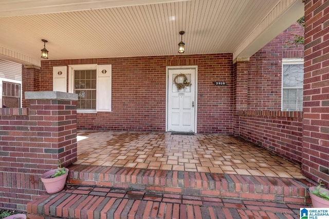 2910 W Meighan Blvd, Gadsden, AL 35904 - property entrance featuring brick siding and a porch