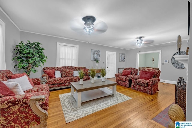 2910 W Meighan Blvd, Gadsden, AL 35904 - living room featuring a ceiling fan, crown molding, and light wood-type flooring