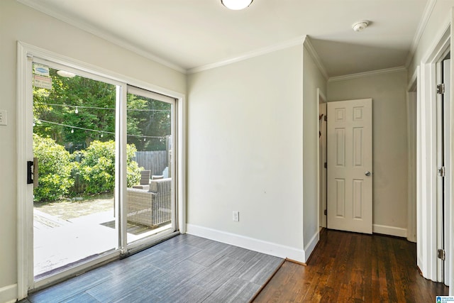 doorway to outside featuring baseboards, dark wood finished floors, and ornamental molding