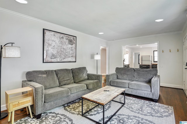 living area with recessed lighting, crown molding, and dark wood finished floors