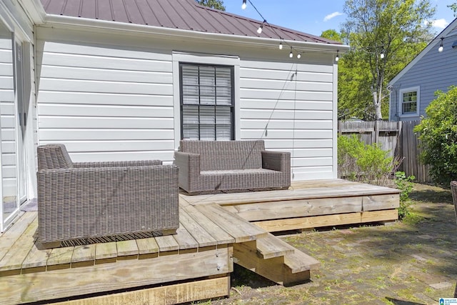 wooden deck featuring fence