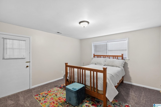 bedroom featuring carpet, visible vents, and baseboards