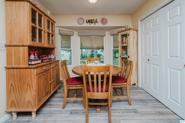 dining room with light wood-type flooring