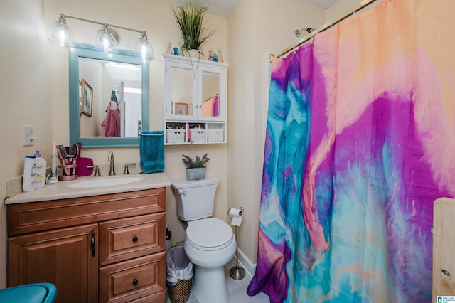 full bathroom with vanity, toilet, and a shower with shower curtain