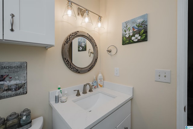 half bath with toilet and vanity
