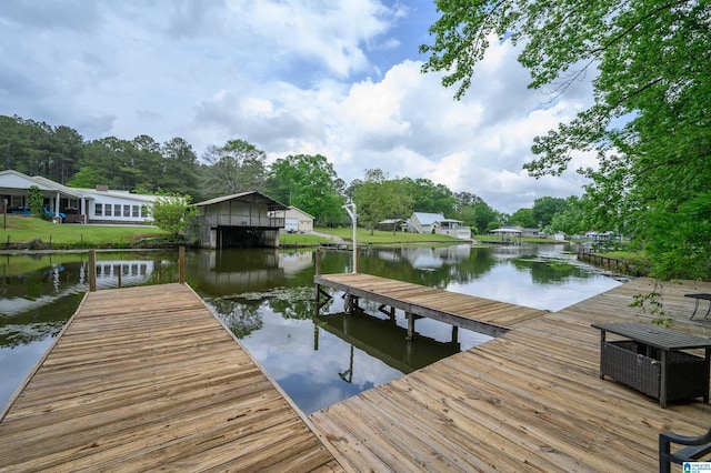 view of dock with a water view