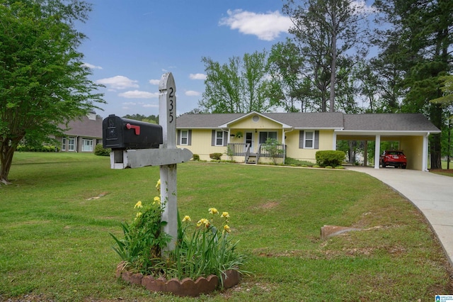 ranch-style house featuring concrete driveway, a front lawn, an attached carport, and covered porch
