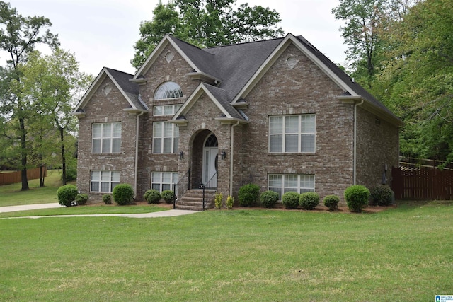2637 Hawthorne Lake Rd, Helena, AL 35022 - split foyer home with fence, a front lawn, and brick siding
