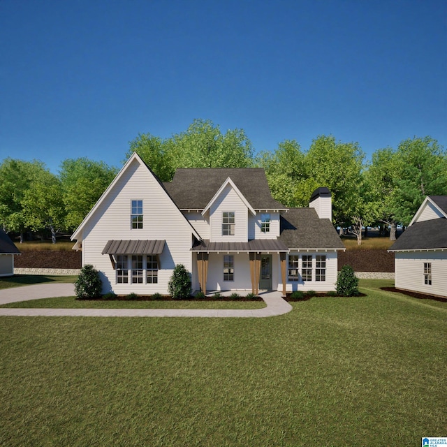 view of front of home with a front lawn, covered porch, metal roof, roof with shingles, and a standing seam roof