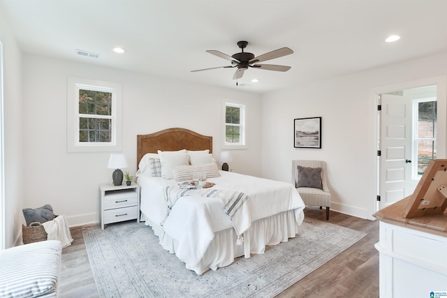 bedroom with recessed lighting, baseboards, visible vents, and light wood-style flooring