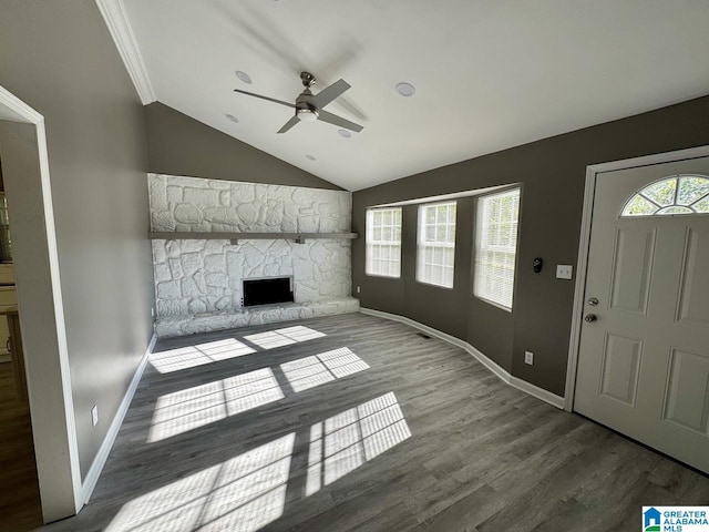 5835 Brenda Dr, Trussville, AL 35173 - unfurnished living room featuring a ceiling fan, wood finished floors, a fireplace, baseboards, and lofted ceiling