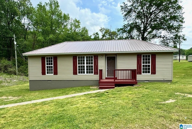 1474 Champion Rd, Oneonta, AL 35121 - view of front facade with a front lawn, crawl space, and metal roof