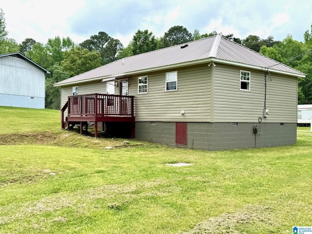 1474 Champion Rd, Oneonta, AL 35121 - back of property with a yard, crawl space, a deck, and metal roof