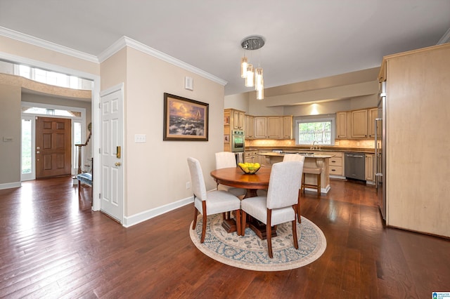 dining room with baseboards, dark wood-style flooring, and crown molding