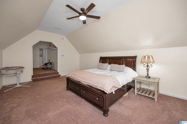 bedroom featuring carpet flooring, ceiling fan, vaulted ceiling, and visible vents