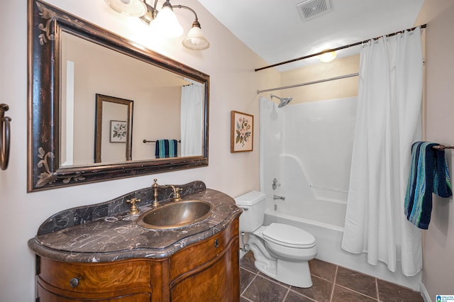 bathroom featuring shower / bath combo, vanity, toilet, visible vents, and tile patterned flooring