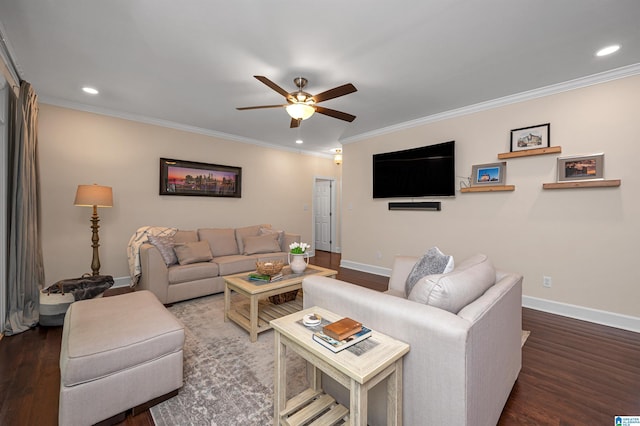 living room featuring wood finished floors, ceiling fan, crown molding, and baseboards