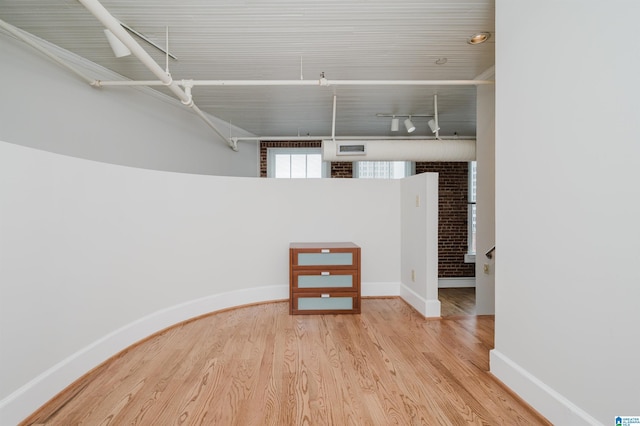 113 N 22nd St Unit 403, Birmingham, AL 35203 - unfurnished room featuring baseboards and wood finished floors