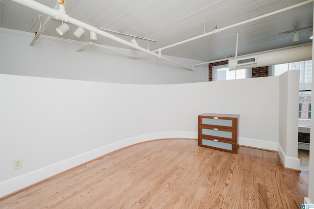 113 N 22nd St Unit 403, Birmingham, AL 35203 - below grade area with baseboards and wood finished floors