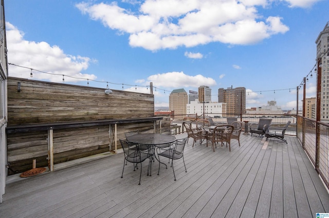113 N 22nd St Unit 403, Birmingham, AL 35203 - wooden terrace with a view of city and outdoor dining area