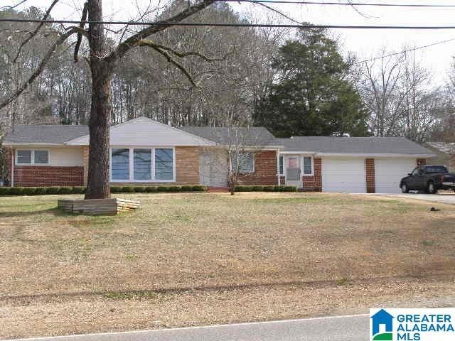 1730 Allison Mill Rd, Talladega, AL 35160 - ranch-style home with brick siding, a front yard, and a garage