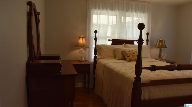 bedroom featuring wood finished floors