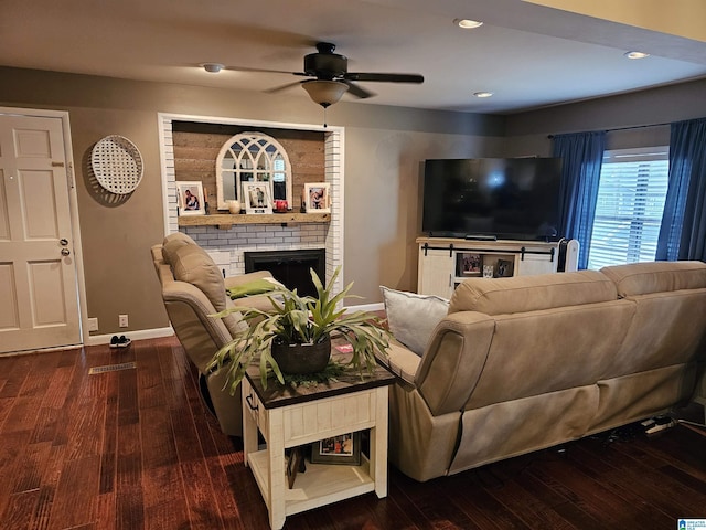 living room with baseboards, recessed lighting, a brick fireplace, ceiling fan, and hardwood / wood-style floors