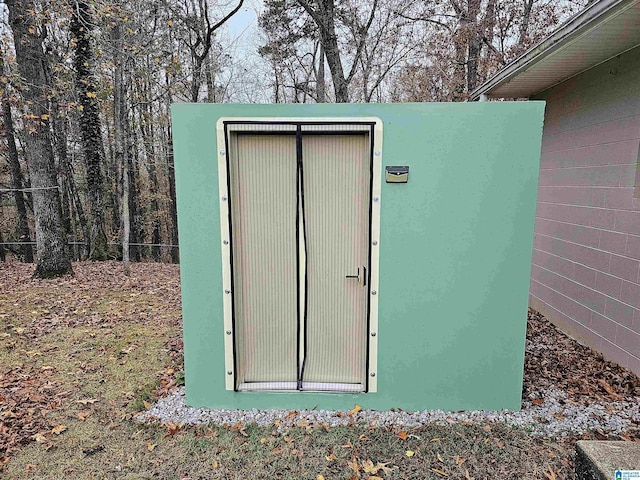 view of outdoor structure featuring fence