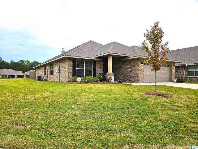 ranch-style house with central air condition unit, brick siding, concrete driveway, and a garage
