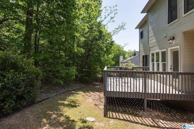 view of yard with a wooden deck