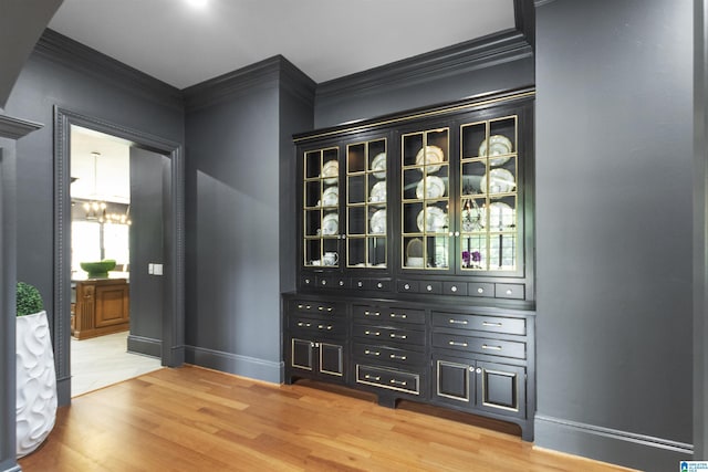 interior space with an inviting chandelier and light wood-style flooring