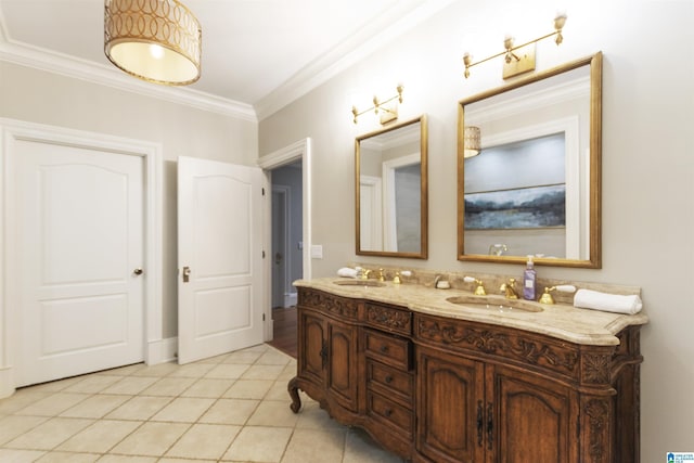 full bathroom with crown molding, a sink, double vanity, and tile patterned floors