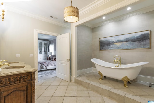 ensuite bathroom with a freestanding bath, visible vents, tile patterned flooring, crown molding, and vanity
