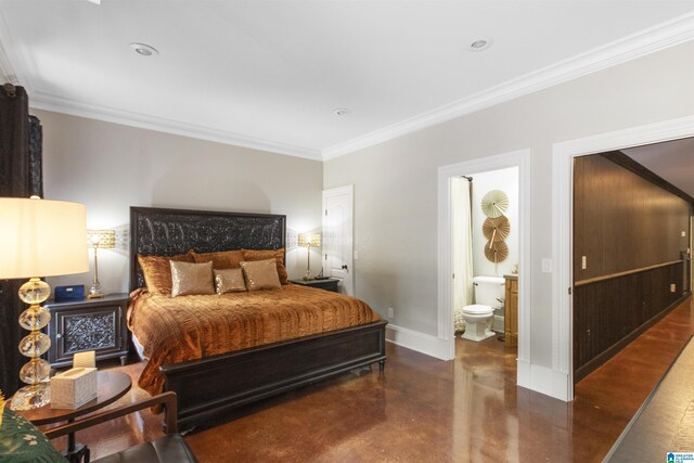 bedroom featuring baseboards, crown molding, ensuite bathroom, and finished concrete flooring