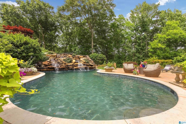 pool featuring an outdoor hangout area