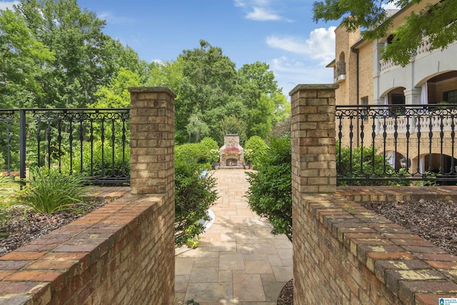 view of gate with fence