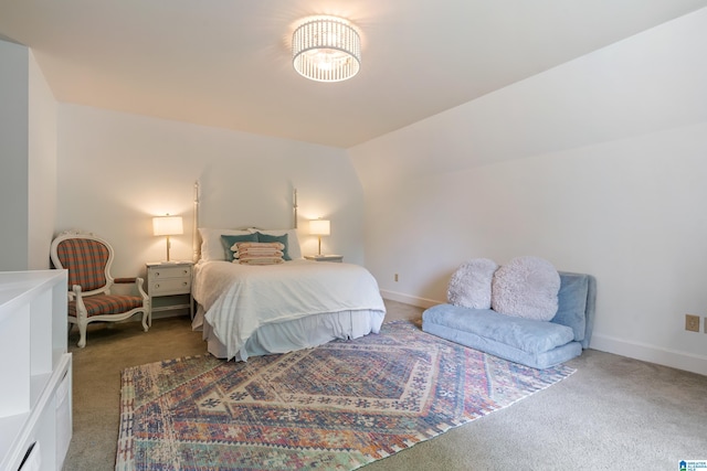bedroom with baseboards and carpet