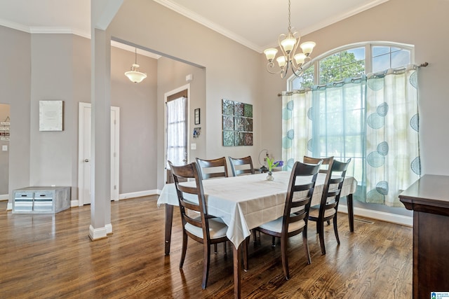 dining room with a notable chandelier, baseboards, crown molding, and dark wood-type flooring