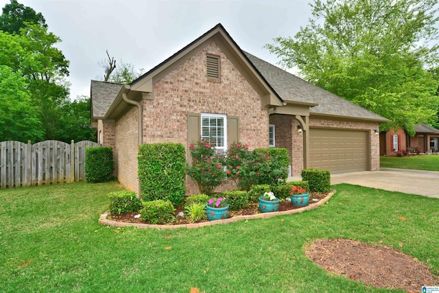 view of front of home featuring a gate, an attached garage, concrete driveway, and brick siding