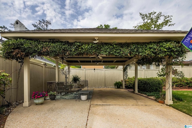 view of patio with a gazebo and a fenced backyard