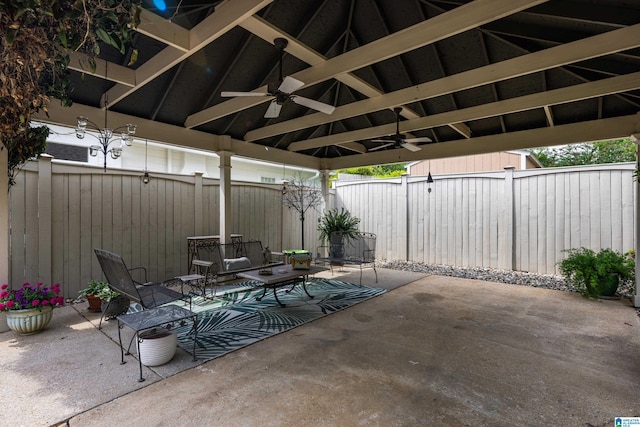 view of patio / terrace with a gazebo, ceiling fan, and a fenced backyard