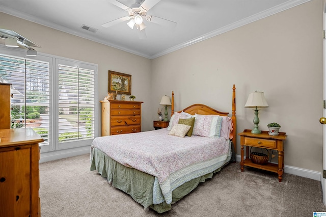 bedroom with baseboards, visible vents, ornamental molding, and light carpet
